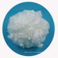 Siliconized solid polyester staple fiber